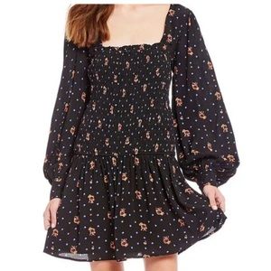Free People, size M, floral dress with smock square neckline, long sleeves.